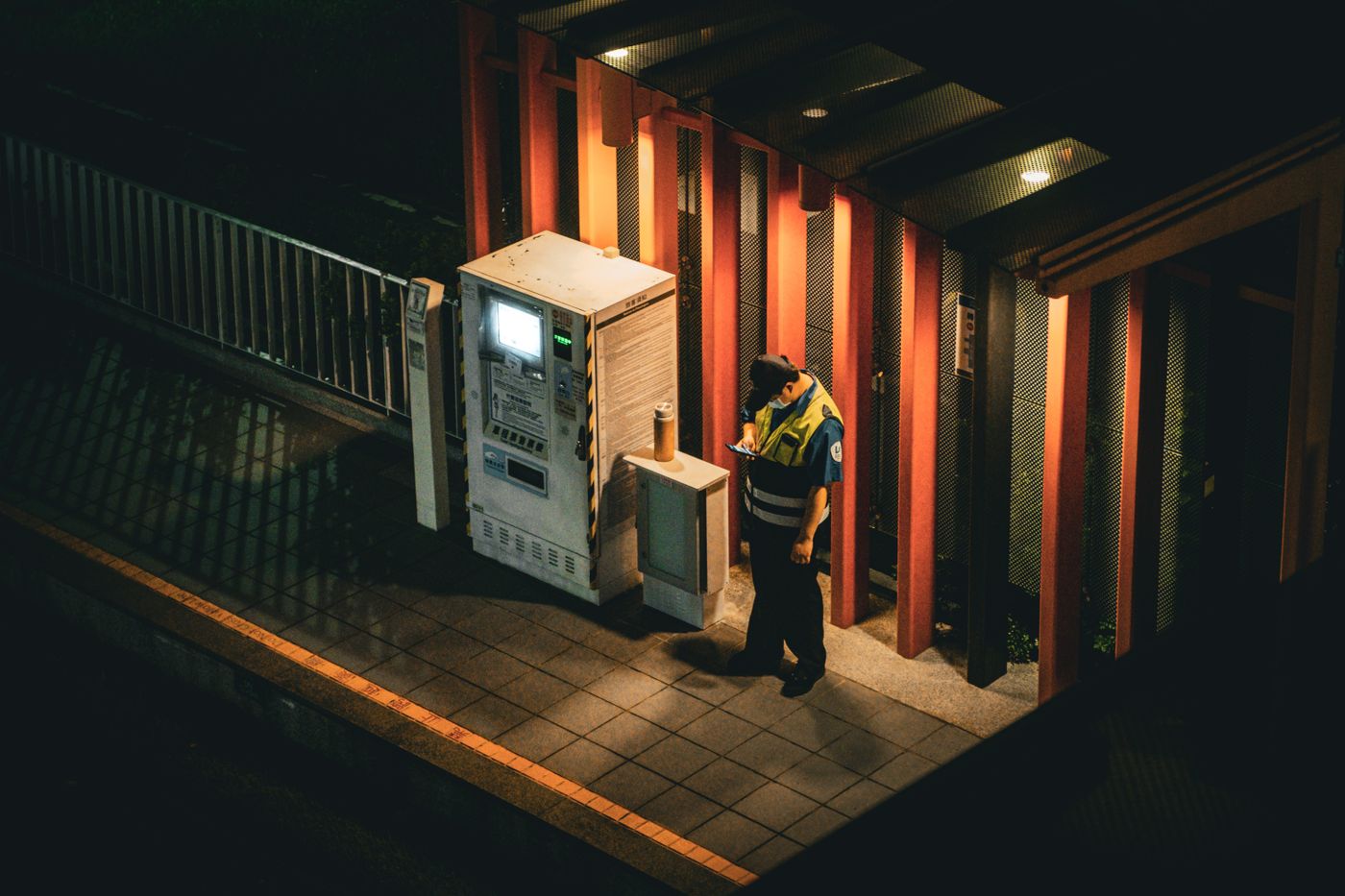 A security guard on night watch at a site